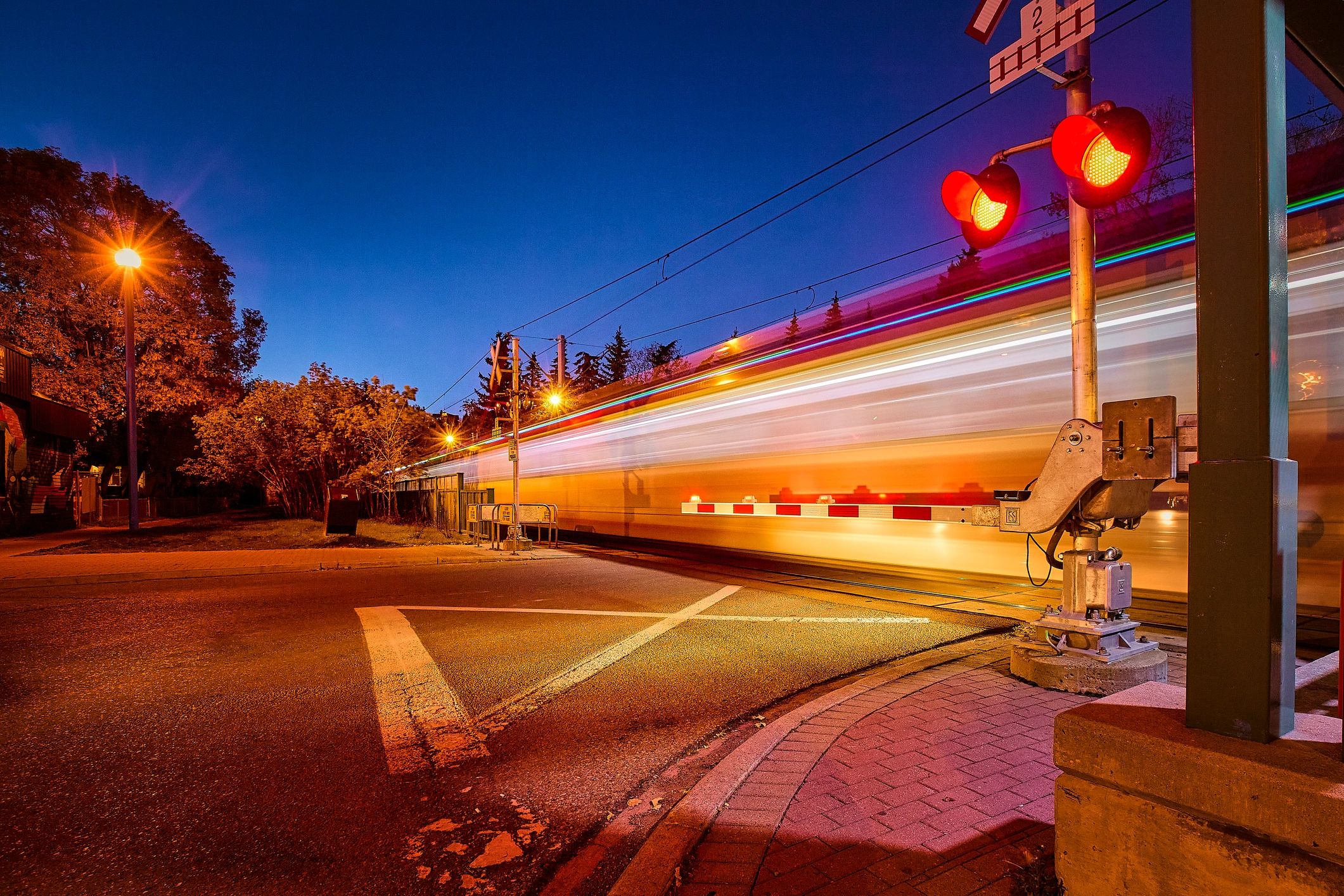 Night street scene with motion light trails
