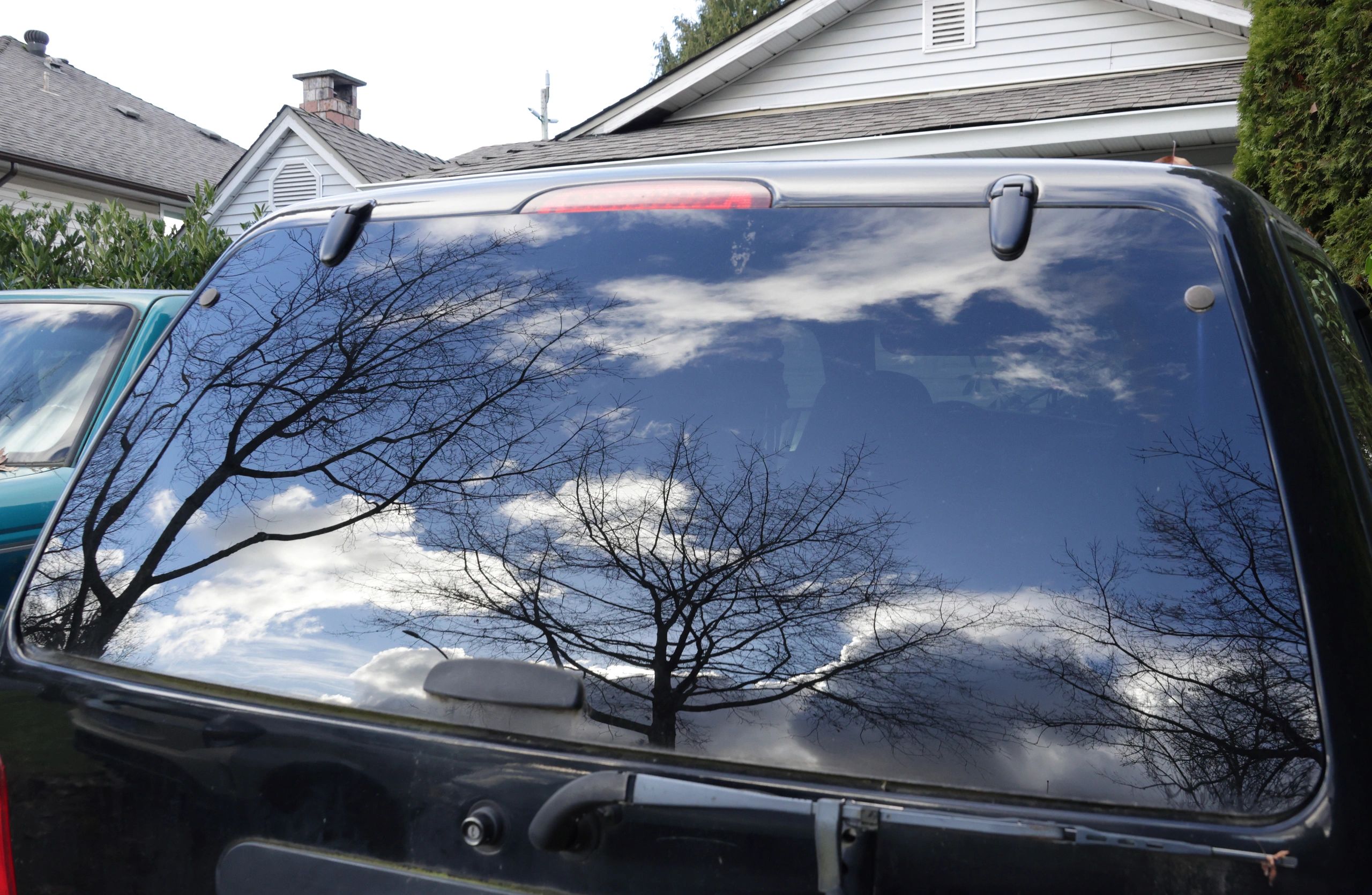 Luxury SUV window with reflections